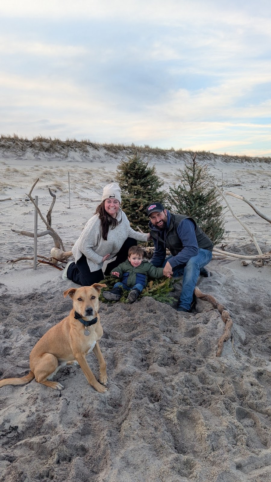 Allie with her family and dog on the Cape Cod dunes